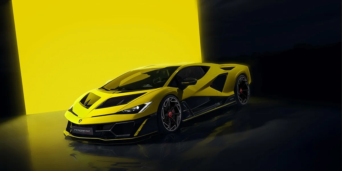 Side front view of Lamborghini Fenomeno hypercar in yellow with black aerodynamic body kit.