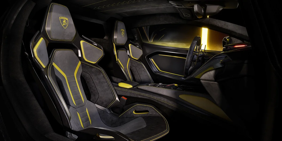 Lamborghini Fenomeno racing-inspired interior with Alcantara sport seats in black and yellow accents.